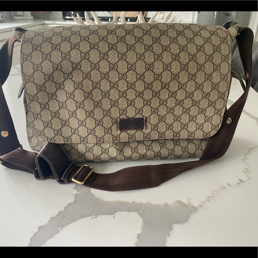 Authentic Gucci Supreme diaper bag.